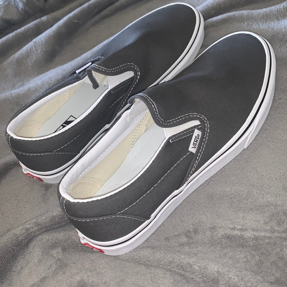 Never worn gray slip on Vans